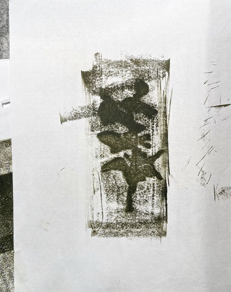 Monoprint experiment in black ink with layered leaf shapes